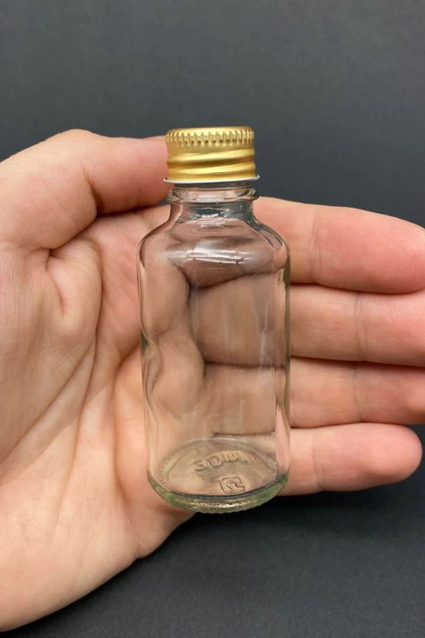Hermia Juego de 6 Botellas de Vidrio con Detalles Dorados de 100 ml Hermia Juego de 6 Botellas de Vidrio con Detalles Dorados de 100 ml